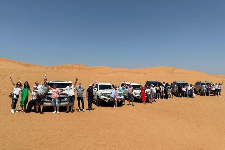 Abu Dhabi : 7 - Heures Safari dans le désert avec barbecue, promenade à dos de chameau et planche à sable