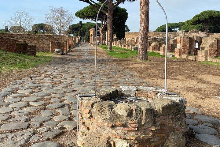 Ancient Rome at Ostia Antica: Ticket, Golf Cart Tour & Aperitivo