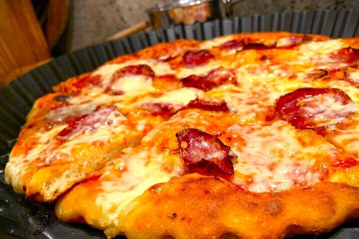 Expérience italienne maison de pizza et de focaccia en famille locale