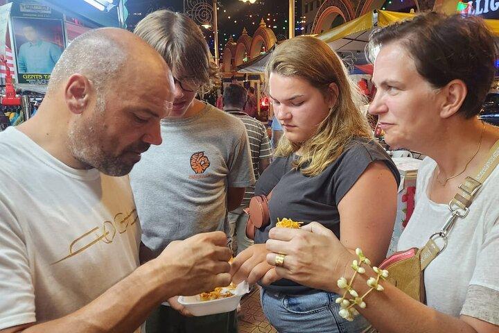 Coma como un local en Kuala Lumpur
