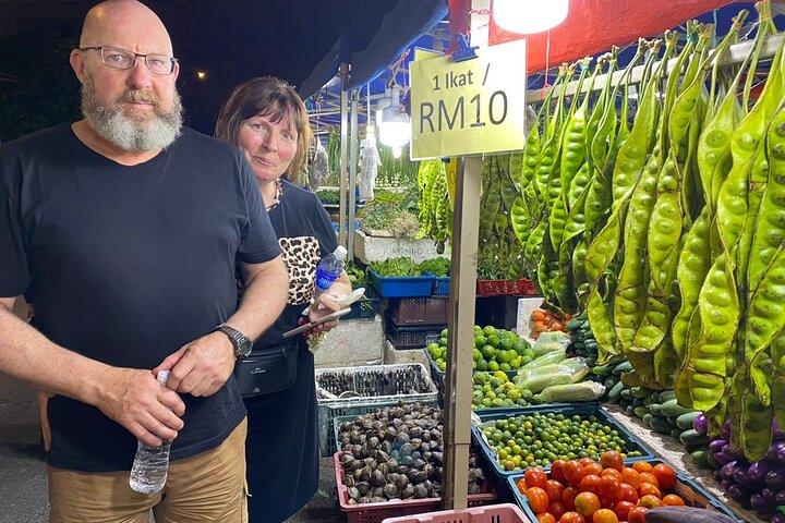 Coma como un local en Kuala Lumpur
