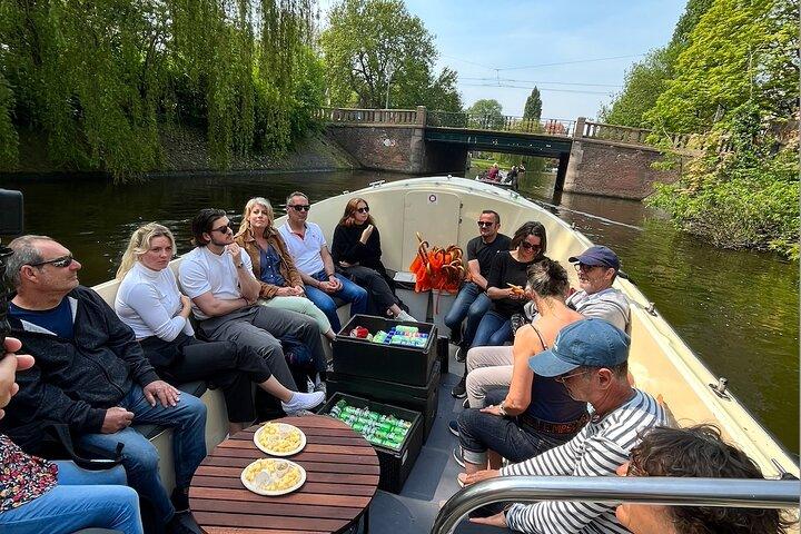 Explorez Amsterdam à Vélo en Compagnie d'un Guide Local Français