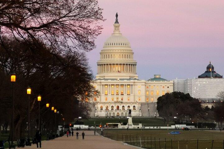 Guided Monuments & Memorials Sunset Tour by Open-top Bus