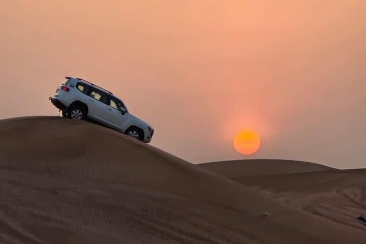 Dubai Evening Safari: Quad Bike, VIP BBQ, 10 Shows & Camel Ride