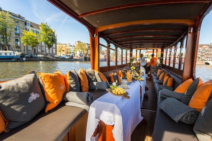Tour storico di Amsterdam su una barca classica da salone