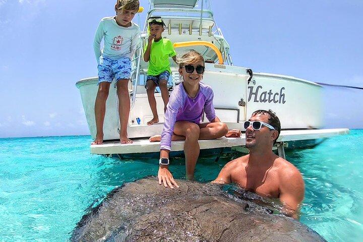 Private Charter 34ft Express Cruiser Stingay City Reef Schnorcheln