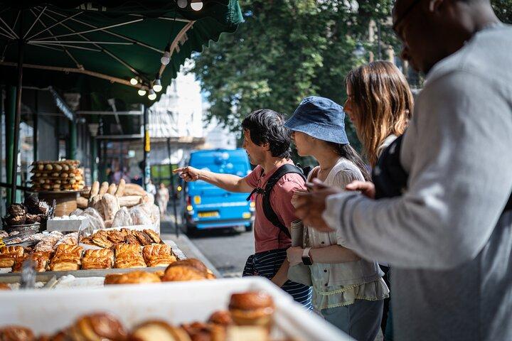 Mangiare cibi britannici & vedere Trenta attrazioni principali