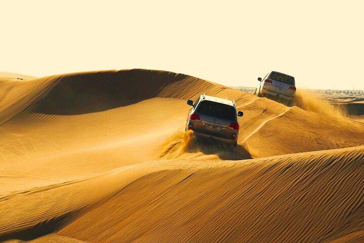 Halve dag safaritour met kameelrit en zandboarden in Doha