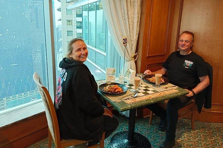 Petronas Twin Tower Skybridge View & Dining Experience Tour with Local Host