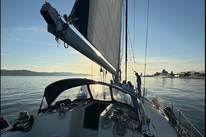Sunset sailboat tour in Lisbon with green wine