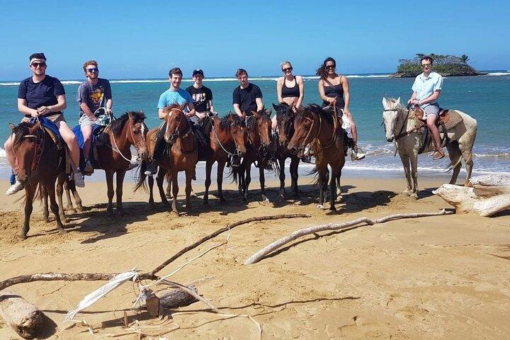 Horseback ridning på stranden