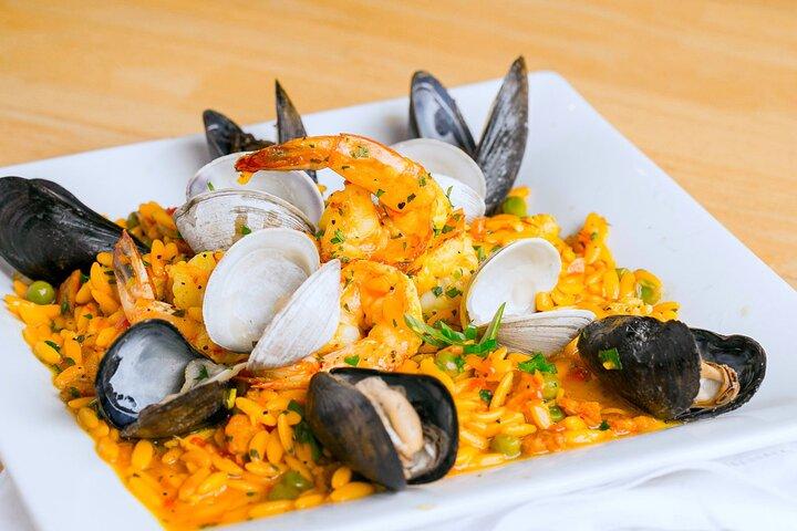 Cuisiner trois types de Paella + Dessert (Comprend 4 - Repas de cours)