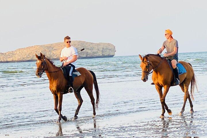 Ridning på muskat strand