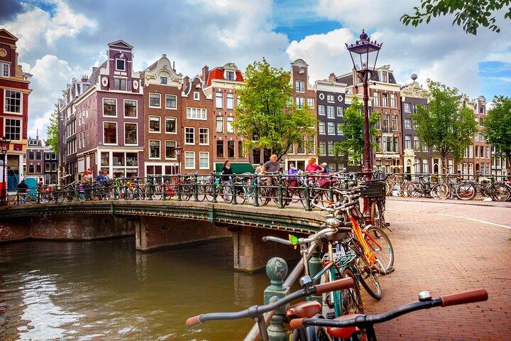 Privé transfer: Rotterdam naar Amsterdam, 2 uur halte in Den Haag