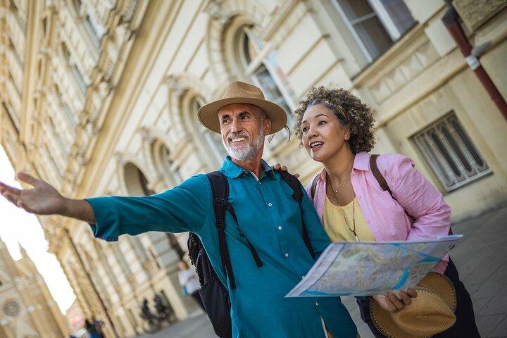 Privé transfer: Rotterdam naar Amsterdam, 2 uur halte in Den Haag