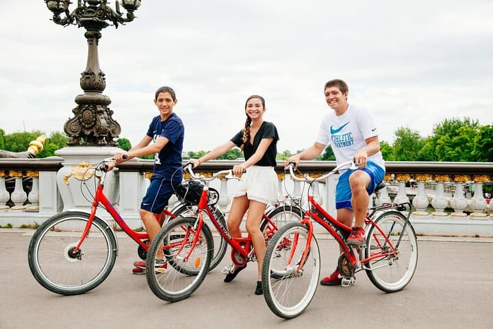 Paris Combo: Highlights Bike Tour & Seine Cruise Experience