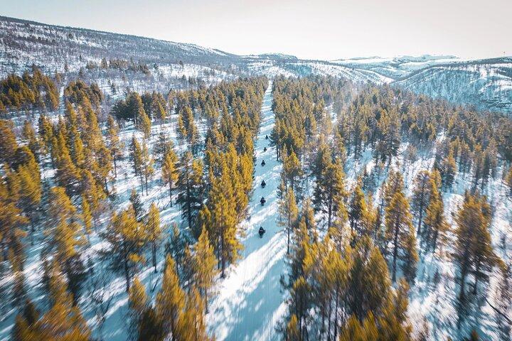 Aventura en moto de nieve y pesca de hielo
