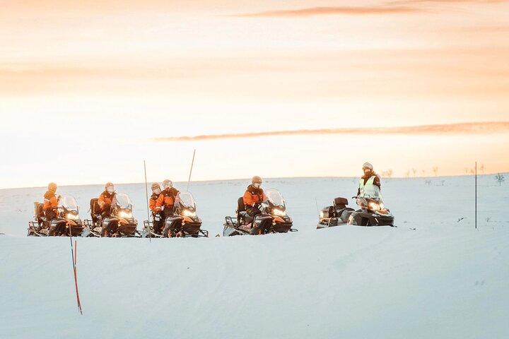 Aventura en moto de nieve y pesca de hielo
