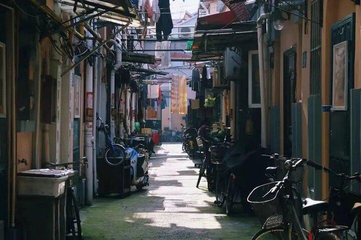 Excursion à vélo d'une demi-journée dans la vieille ville de Shanghai avec dégustation de nourriture