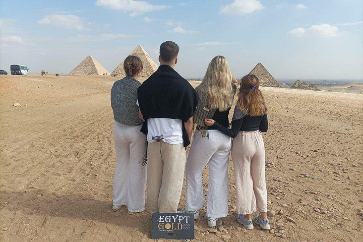 All inclusive,Giza Pyramids camel ride,lunch,&inside pyramids