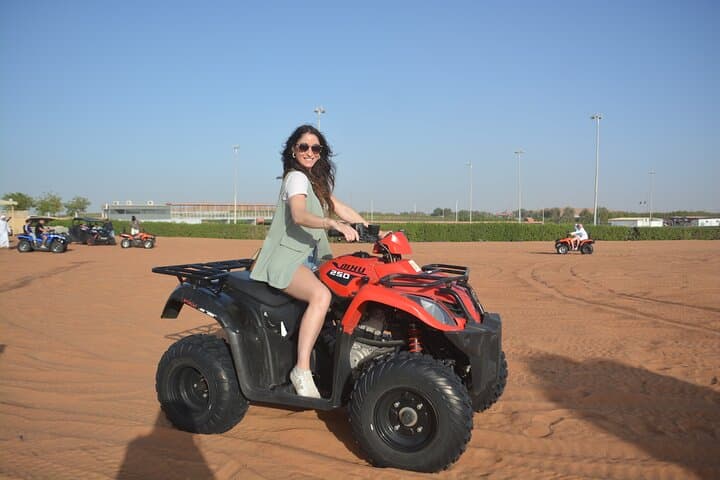 Short Desert Tour with Quad Bike Camel Ride Sandboard & Sunset