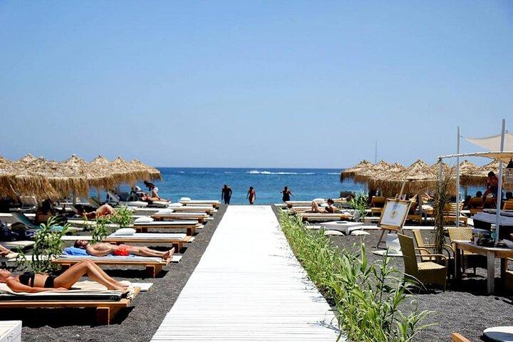 Transporte de ida e volta para Black Sand Beach a partir de Your Santorini Hotel