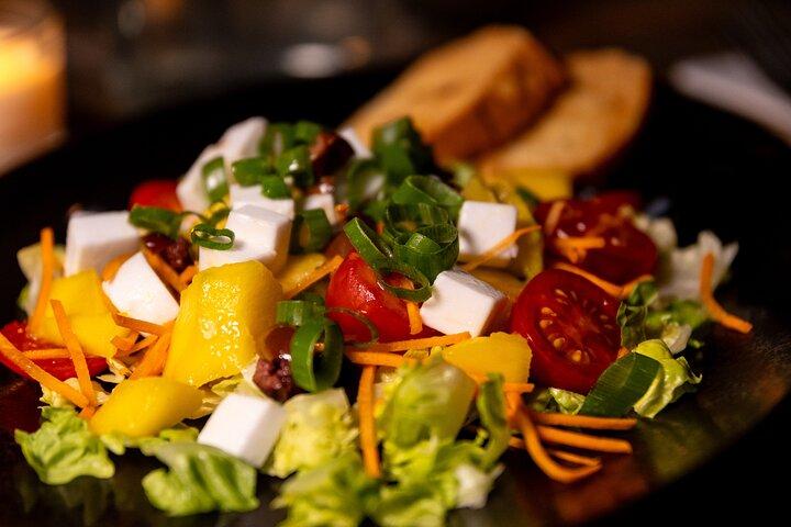 Cena romantica nel buio di Amsterdam