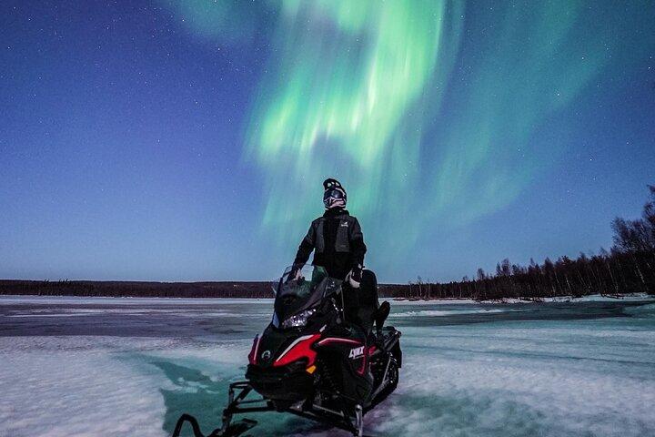 Snowmobile Night Tour Rovaniemi in small group