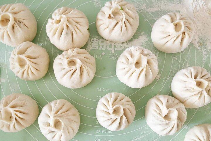 Corso di cucina mezza giornata con panini al vapore (Bao) con visita al mercato locale