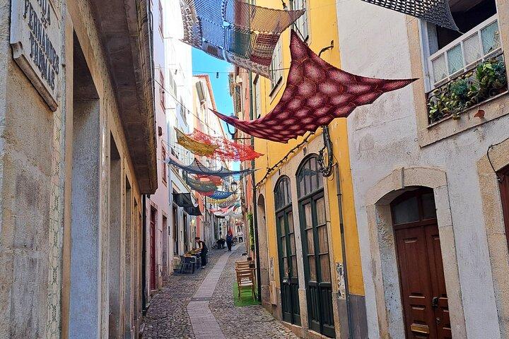 Coimbra Adventure Discovery and Learning with a Local