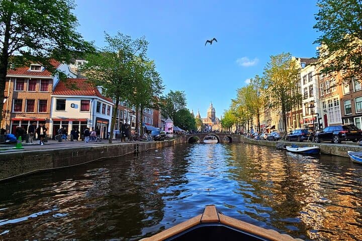 Amsterdam Canal Tour by Open Boat – 90 min Small Group Experience