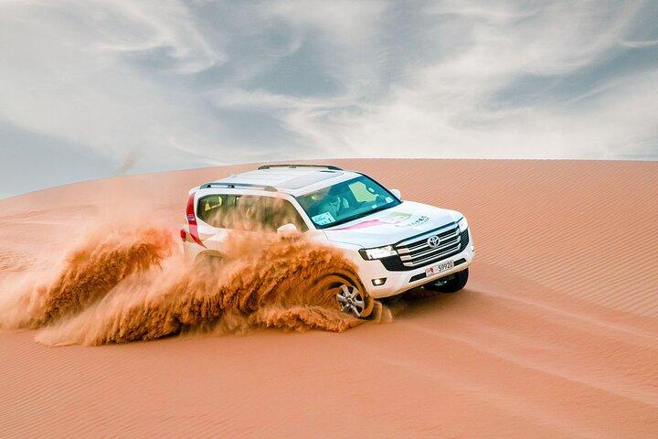 Abu Dhabi : Morning Dune Drive, Camel Ride & Sandboarding