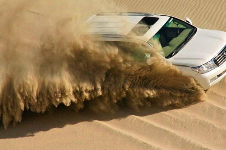 Doha Private Dune Bashing, Camel Ride & Sandboarding & Binnenzee