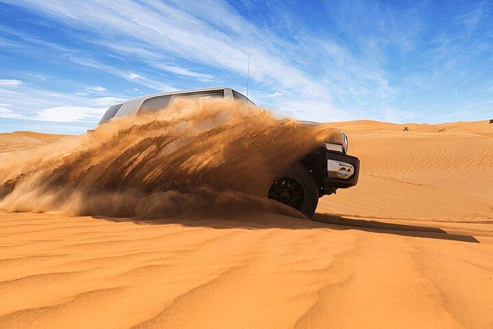Dubai : Morning Pick/Drop 4x4 Red Dunes Drive Camello & Sand Surfing