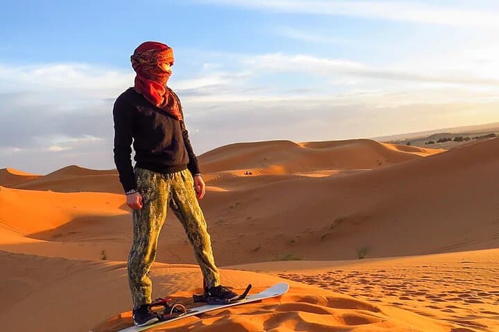 Exclusive Desert Safari Dubai with Camel Ride & Sandboarding