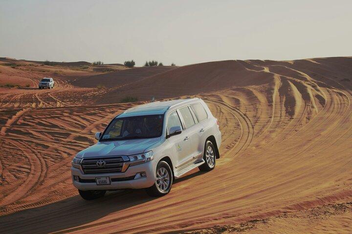 Desert Dune Bashing, Camel Ride, Sandboarding e Mare Interno.
