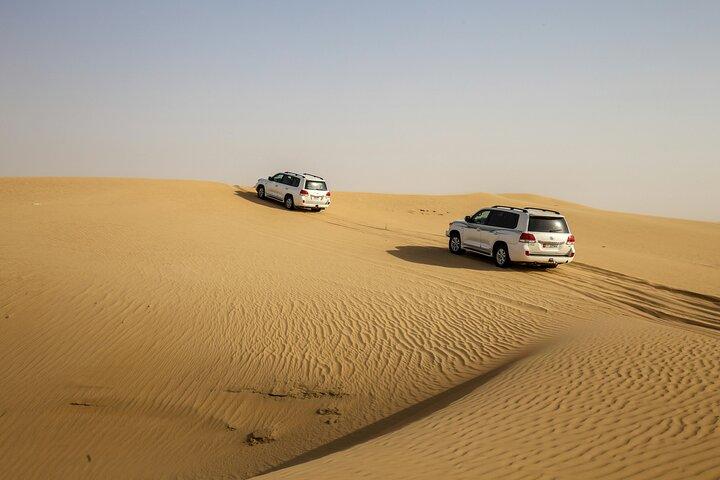 Sunset Desert Safari com BBQ Dune Bashing Camel e mais