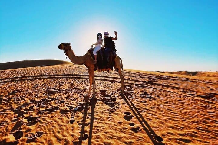 Exclusive Desert Safari Dubai with Camel Ride & Sandboarding