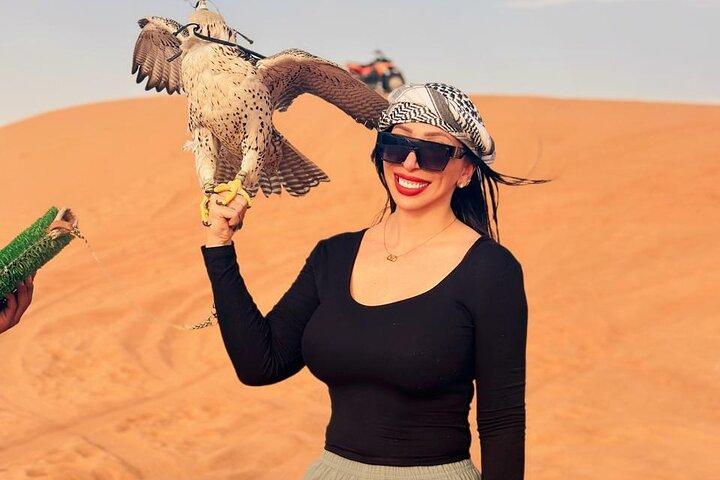 Dubai Desert Escape: Safari Red Dunes, Falcon, Camel & BBQ Dinner