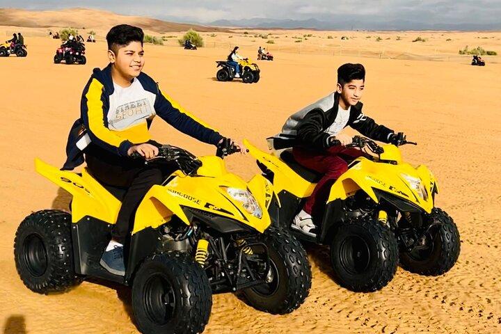 Dubai Desert Safari with ATV Riding & Unlimited Buffets & BBQ