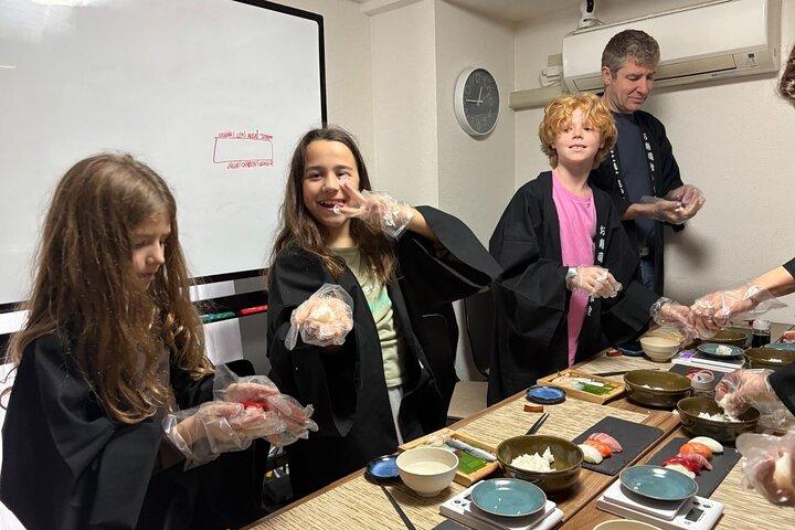 Mochi Pounding and Sushi Making Experience in Tokyo