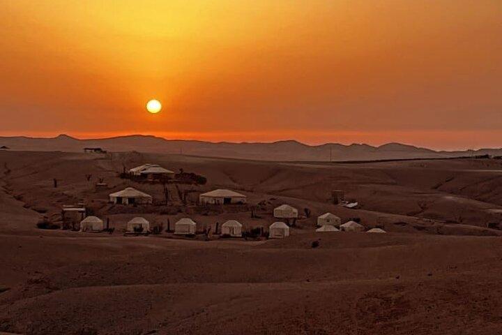Agafay desert dinner show camel ride with sunset
