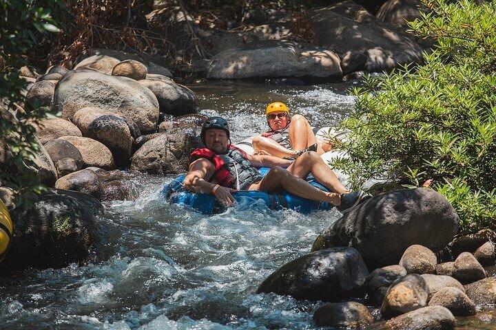 Privétour naar de La Leona-waterval met tubing, canopy tour en lunch.