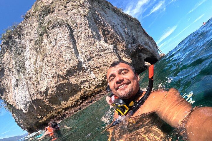 Snorkeling e indimenticabile gita in barca al Santuario di Los Arcos.