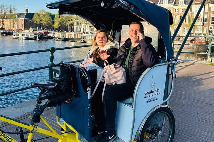 Explore Amsterdam in 75 Minutes – Pedicab Rickshaw City tour