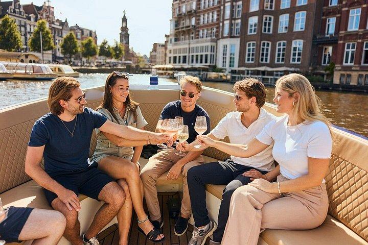 Amsterdam Open Boat Canal Cruise with Onboard Bar with Live Guide