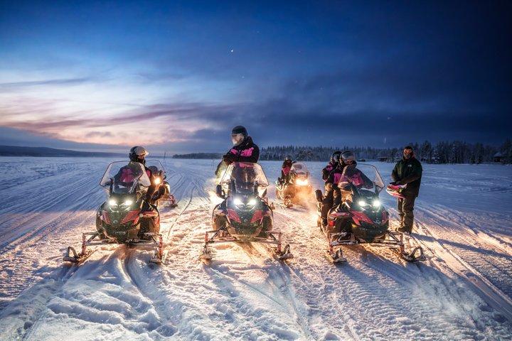Snowmobile Night Tour Rovaniemi in small group