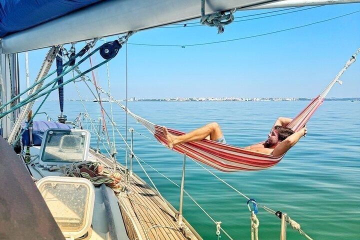 Lisbon Private Boat Tour Sightseeing Swimming and Wine