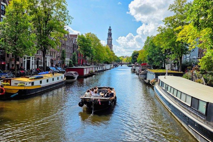 Crociera privata di esplorazione della cintura dei canali di Amsterdam di 90 minuti