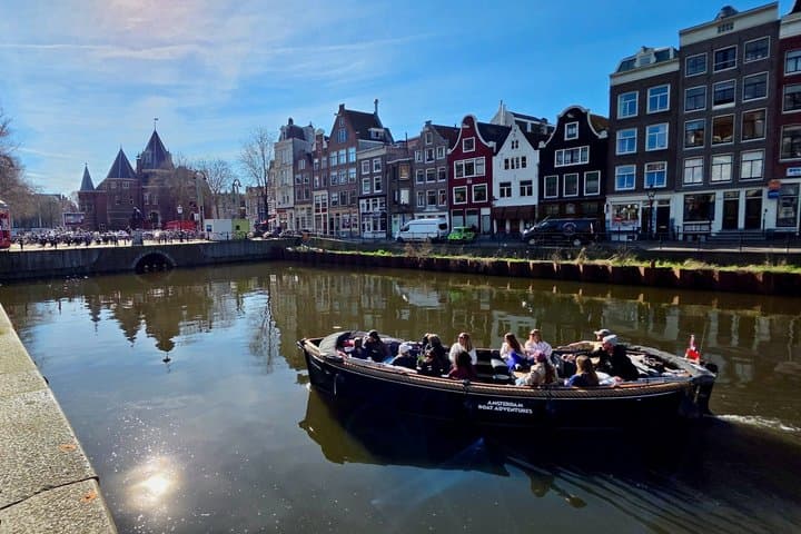 Amsterdam Canal Tour by Open Boat – 90 min Small Group Experience